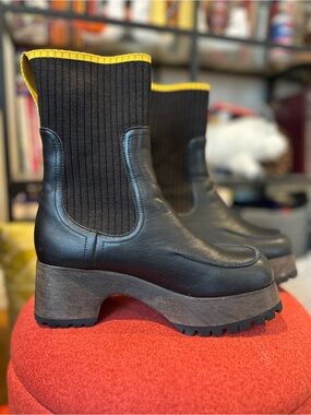 Charlotte Stone Black Loma Platform Sock Lug Sole Boots with Yellow Trim